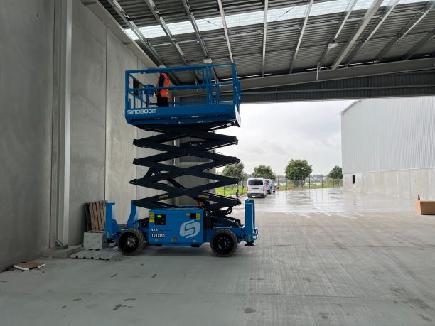 Scissor lift on construction site