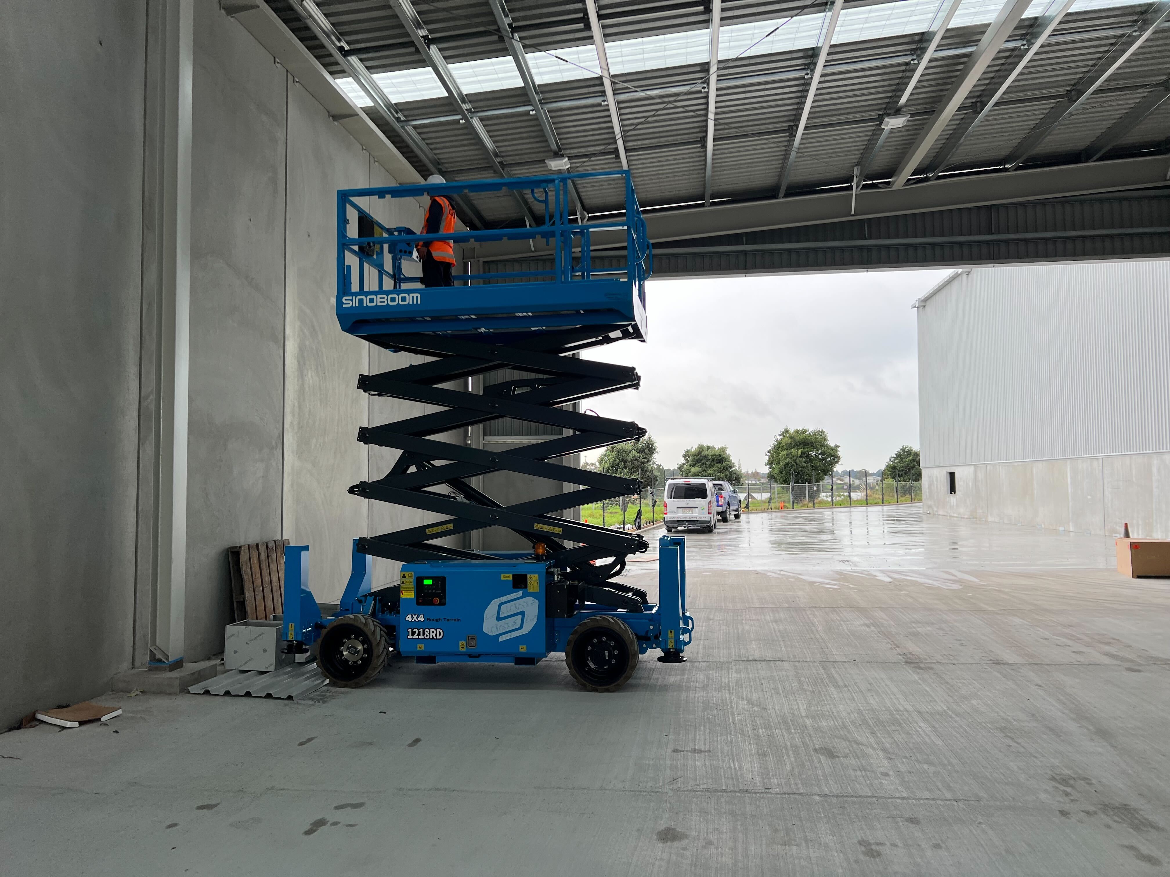 Scissor lift on job site